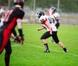© BillionPhotos.com - People Playing American Football