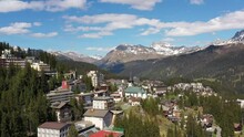 Aerial Drone Footage Of The Arosa Ski Resort And Village In Spring In Canton Graubunden In The Alps In Switzerland. Shot With A Forward Motion