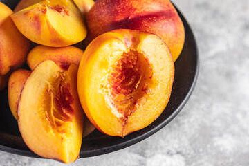 nectarine or peach sweet fruit natural dessert sweets meal snack on the table copy space food background rustic. top view keto or paleo diet veggie vegan or vegetarian food