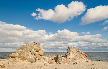 Poster - Cape Kolka with stones, clouds and Baltic sea, Kolka, Latvia.