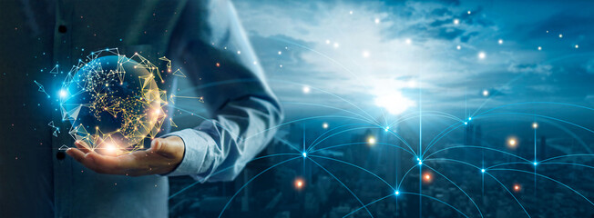 Leinwandbilder - Businessman holding global digital network and data customer connection, Social network and data exchange of technology, Networking structure on blue city background.