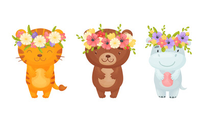 Wall Mural - Adorable baby animals in wreaths of colorful flowers set. Lovely tiger, bear, hippo with floral wreath cartoon vector illustration