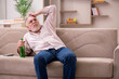 © Elnur - Old man drinking alcohol at home