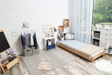 Poster - Montessori bedroom interior with floor bed and toys