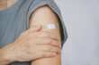 © Ratana21 - senior woman feel painful her arm after got vaccinated or inoculation due to spread of corona virus, population, social or herd immunity, vaccine effect concept