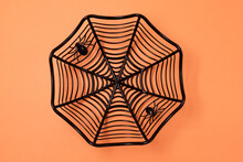 Halloween Holiday Black Dishes In Shape Of Spider Web Orange Background Holiday