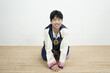 웃으며 멍석에서 절하고 있는 소년 a smiling boy bowing on the mat wearing Korean traditional costume Hanbok