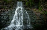 Fototapeta Łazienka - Details of a beautiful waterfall in a countryside