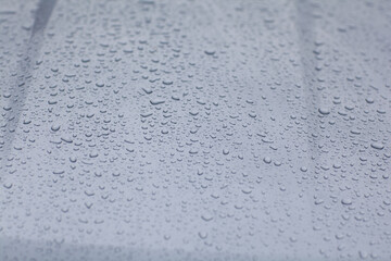 Droplets on the car surface.