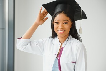 portrait of african female doctor graduate