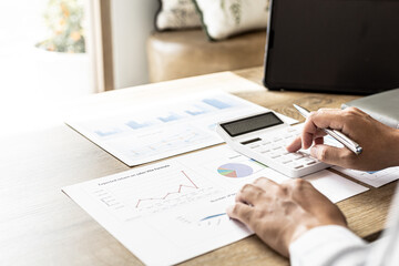 Poster - Financial scholars are pressing white calculators to calculate numbers on financial documents to verify the accuracy of company financial data line and pie chart documents. Finance concept.