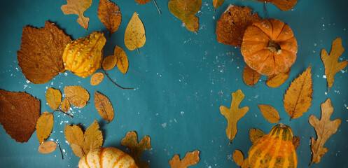 Poster - Leaves with autumn pumpkins as Thanksgiving holiday flat lay.