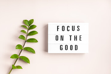Wall Mural - Lightbox with text focus on the good. Mental health, positive thinking idea