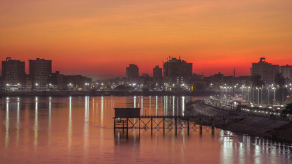 Sticker - Golden sunset sky over the Sohag city in Egypt