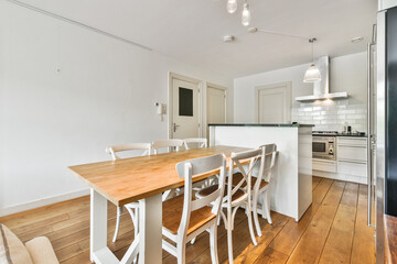 Poster - Kitchen and the dining room of a modern apartment