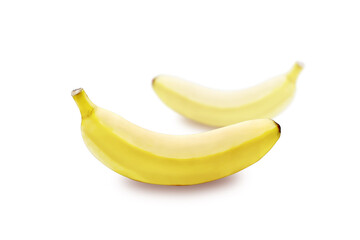 Closeup of two bananas on the white background.