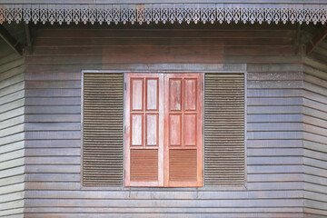 Wall Mural - Old wooden window in vintage and antique style for building and decoration a house in the countryside of Thailand.