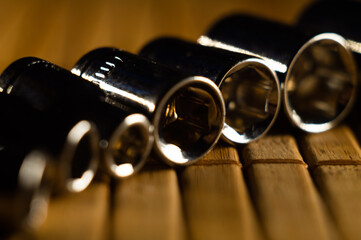 Sticker - Closeup shot of the metallic nozzles of different sizes of a tool