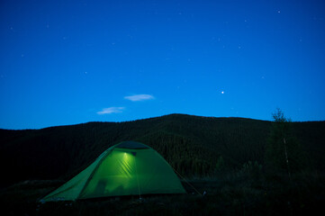 Wall Mural - beautiful night landscape, vacation with a tent in the mountains