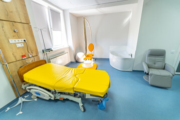 Wall Mural - Hospital baby health care. Modern patient beds in a maternity ward. View of the interior. Medicine concept