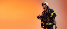 Flyer. One Male Firefighter Dressed In Uniform Posing Over Orange Background In Neon Lights.