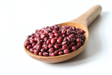 Wall Mural - red beans in a wooden spoon