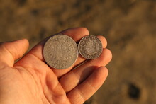 Vintage Austrian Silver Coins In Hand