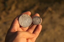 Vintage Austrian Silver Coins In Hand