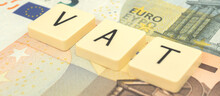 Banner European VAT Taxes Return And Income, VAT Word Or Text And Euro Money Banknotes Background. Financial And Economic Business Photo