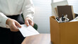 © mojo_cp - Business people breaking the contract with resignation letter staff reduction resigning leaving the office employee Resignation.