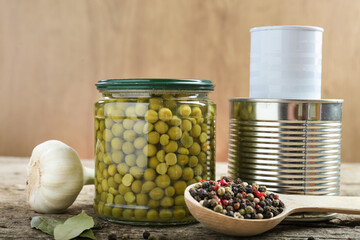 Wall Mural - canned fresh domestic peas in a jar on an old rustic table