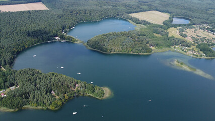 Aerial view of lake Zootzensee in the Rheinsberg Region, Brandenburg, Germany in August high season summertime.