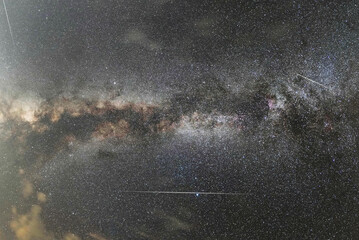 Wall Mural - bright panoramic milky way galaxy on the starry sky. space wallpaper. astronomical background.