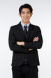 © Bangkok Click Studio - Portrait shot of Asian young black short hair happy rich ceo businessman office director in formal suit with necktie standing smiling cross arms at chest look at camera in front of white background