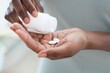 © Science RF - Pouring pills into hand