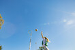 © Austockphoto - horizontal shot of a young woman celebrating after scoring in a net ball game