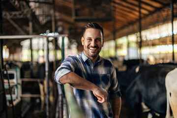 Wall Mural - Adult man, working hard on the farm.