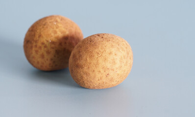 Wall Mural - fresh longan isolated background. Asian fruit