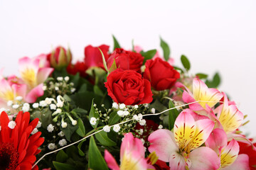 Wall Mural - Closeup shot of a bunch of flowers with beautiful decorations on a white background