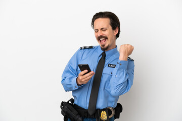  Young police man over isolated background white with phone in victory position
