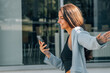 © carballo - girl with mobile phone on the city street