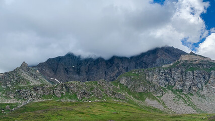 Poster - Hills under the clouds in the Gran Paradiso National Park in Italian Alps