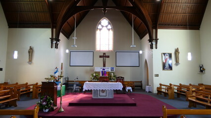 shot of religious Christian or catholic chapel and altar for worshippers
