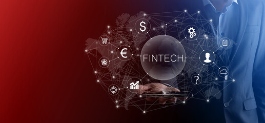 Businessman hold Fintech -financial technology concept.Business investment banking payment. Cryptocurrency investment and digital money. Business concept on virtual screen.