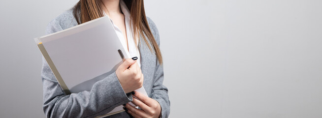 Wall Mural - business woman holding documents