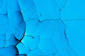 Poster - wall with blue paint in the cracks. background for design. grunge texture