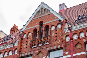 Vyborg, Russia, July 25, 2021. Fragment of a typical facade of a building of a historical architectural ensemble