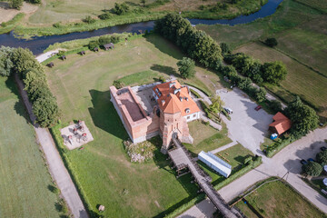 Sticker - High angle view of medieval castle and Liwiec river in Liw, small village in Wegro County, Masovia region of Poland