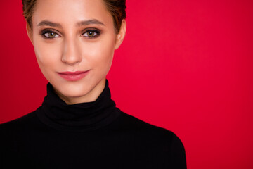 Poster - Cropped view portrait of attractive cheery winsome girl copy space ad isolated over vibrant red color background