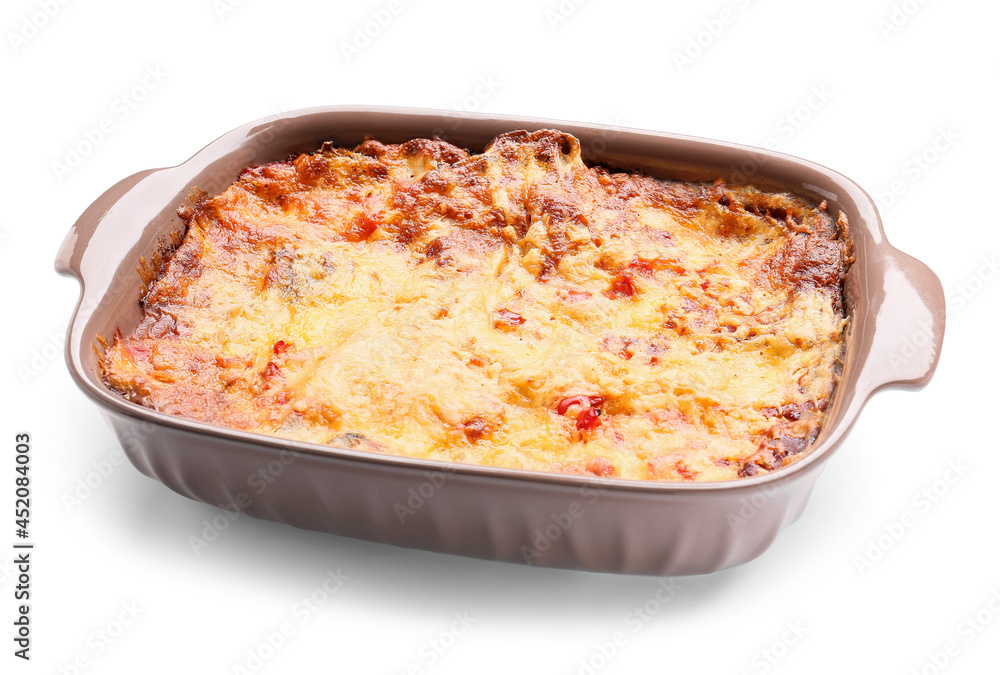 Baking dish with tasty vegetable lasagna on white background